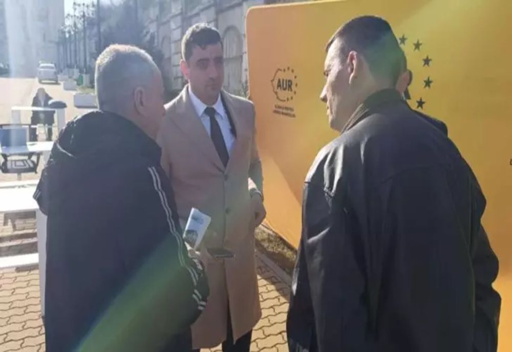 Protest AUR în faţa fostului sediu al PNL. Replici acide între George Simion și jandarmi